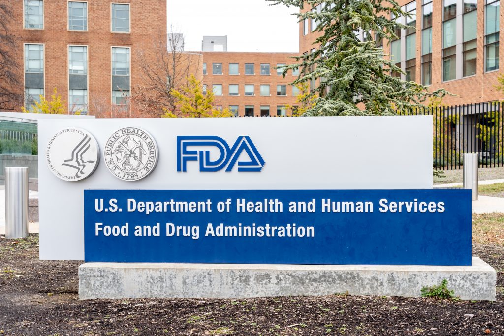 Image of FDA sign in front of FDA building.